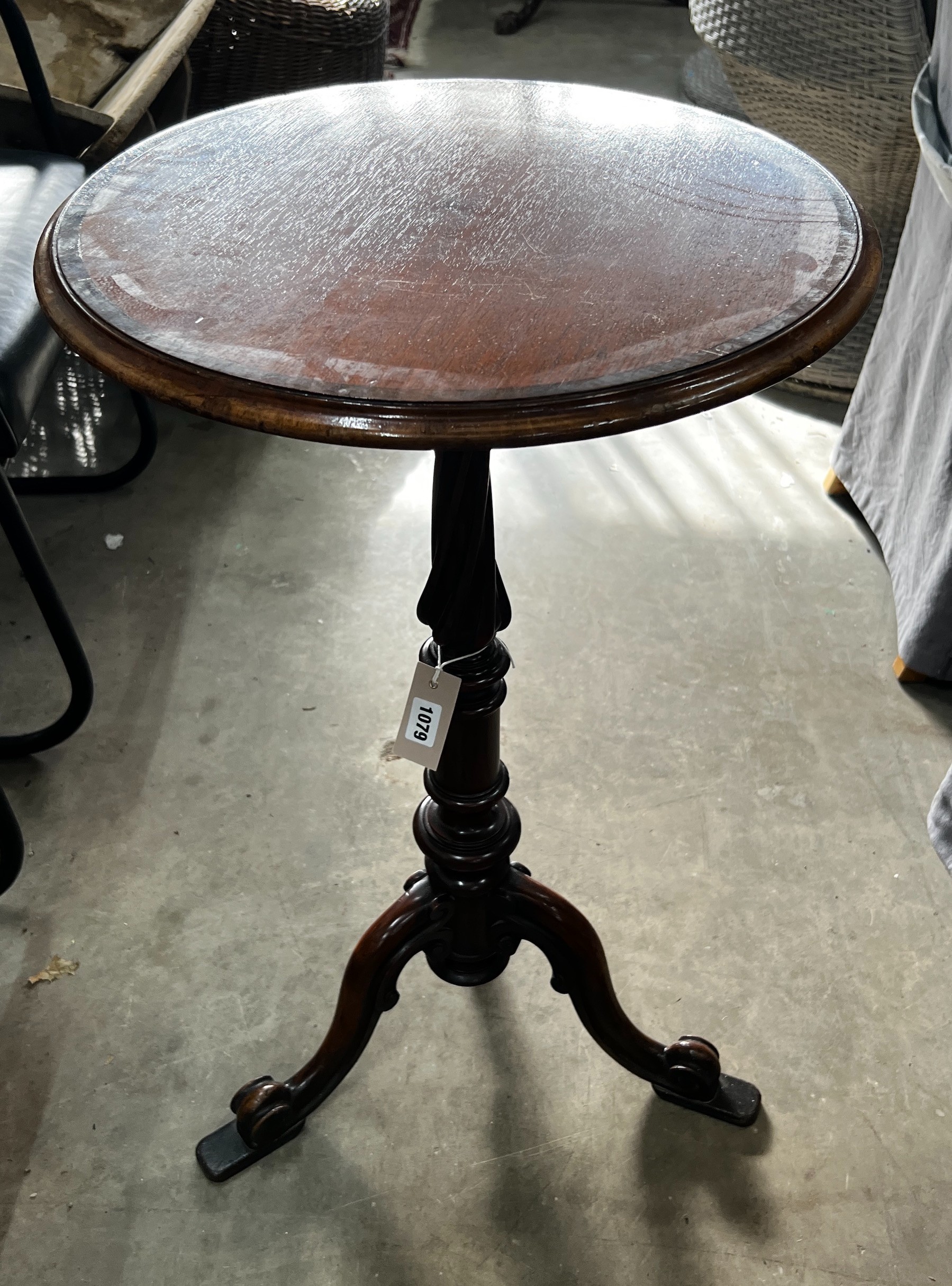 A Victorian and later circular mahogany wine table, bears T & G Seddon paper label, diameter 46cm, height 74cm